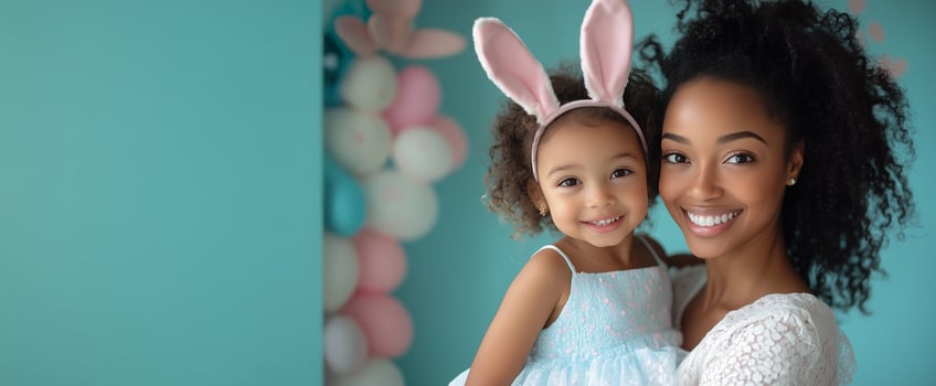 Mother and daughter celebrate spring with bunny ears and smiles in a colorful setting photo