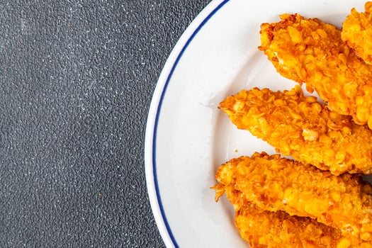 Chicken nuggets in breaded deep fried fresh tasty food dish delicious gourmet food background on the table rustic food top view copy photo
