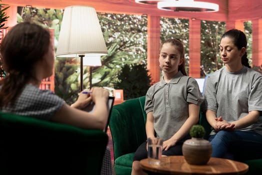 Family therapy session focuses on strengthening the bond between mother and daughter, addressing adolescence, mental wellbeing and emotional management with the psychologist. Social issues. photo
