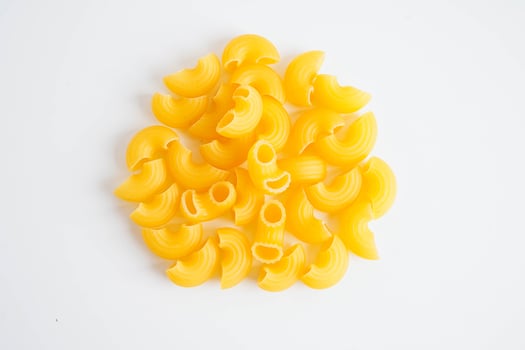 Pasta noodles for cooking Italian food in plastic bag photo