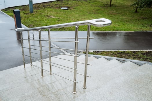 A stainless steel railing on stairs not only offers support and safety but also adds a modern touch to the property. Its sleek design complements the contemporary aesthetic of the space photo