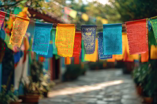 Colorful prayer flags hanging in a tranquil buddhist temple. photo