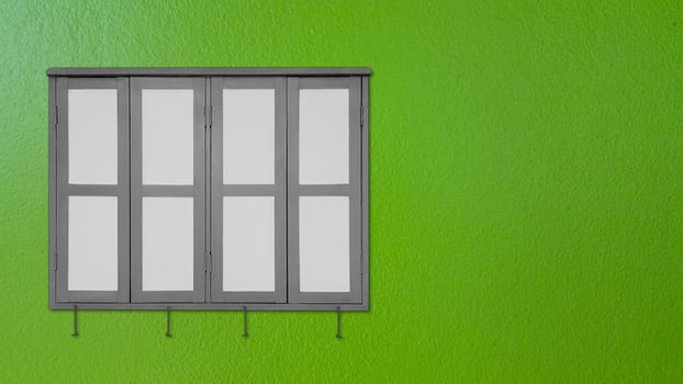 Window on green walls photo