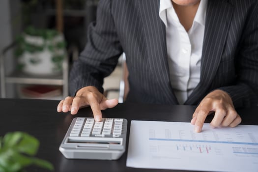business man Auditor or internal revenue service staff checking annual financial statements Audit Accounting tax. photo