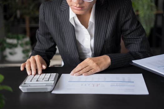 business woman Auditor or internal revenue service staff checking annual financial statements company Audit Accounting tax photo