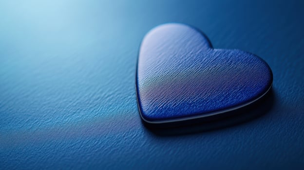 Heart shaped object on a blue background representing love and affection in a calm setting photo