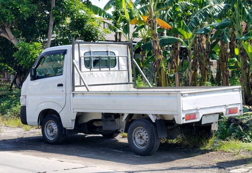 Back view white mini truck. shipping transportation. photo