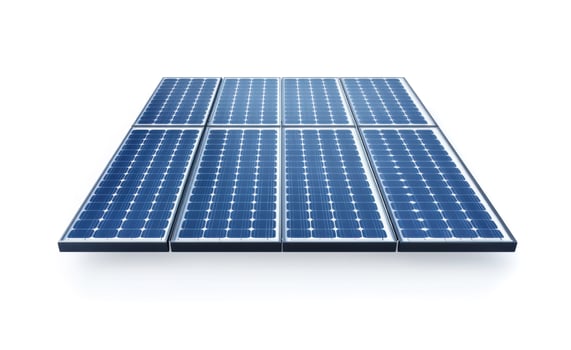 Solar panels arranged in a grid pattern on a clean surface under bright lighting photo