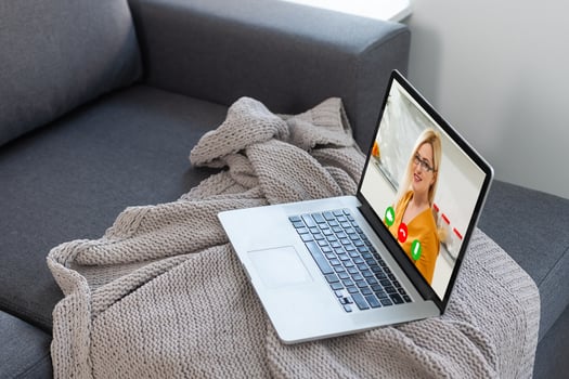 Teacher Hosting Online Class Using Conference On Laptop photo