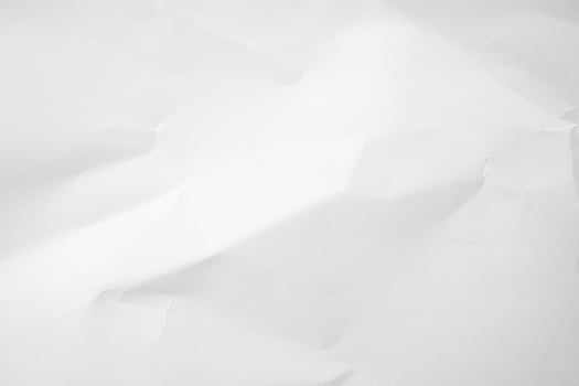 white paper background crumpled edges. photo