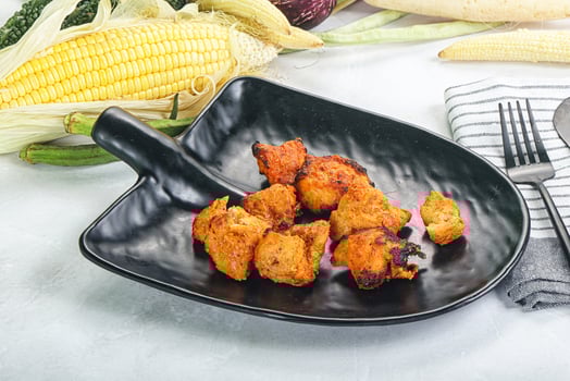 A plate with some food on it and a fork photo