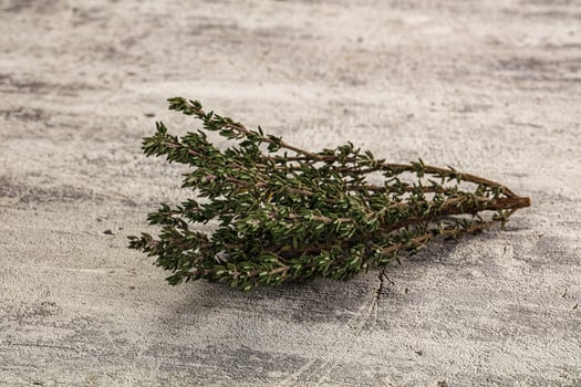 A bunch of herbs on a table photo