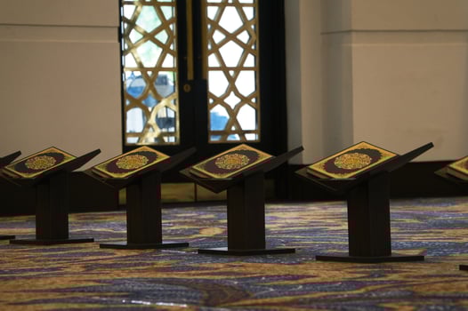 Prayer Room Interior With Quran Stands in Minimalist Decor photo