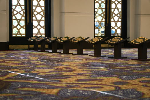 Elegant Prayer Room Interior With Quran Stands in Minimalist Decor photo