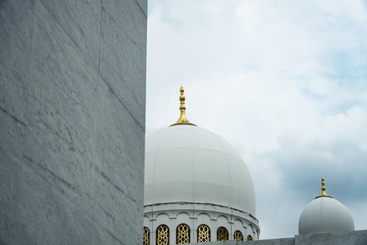 Sheikh Zayed Grand Mosque Dome in Front of a Dramatic Cloudy Sky photo