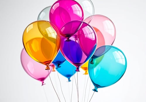a bunch of glossy colorful balloons on a white background photo