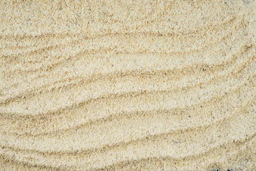 Aesthetic sand background with flow line texture photo