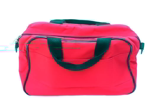 Red bag isolated on white background. Concept, equipment for containing things or cloth when traveling. Baggage or luggage using in daily life. photo