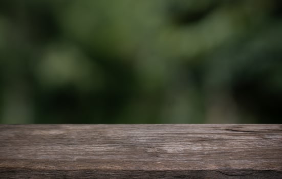 a wooden table with a blurred background. photo