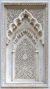 A white archway with a lot of detail photo