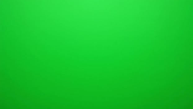 Solid vibrant green background perfect for chroma keying. photo