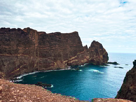 Madeira island Portugal hills cliff rocks geology blue lagoon water stream Atlantic Ocean shore seascape rough mountains scenery vacation hiking trail solitude sightseeing horizontal photography photo