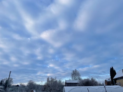 Winter sky in the village with soft pastel hues 27 photo