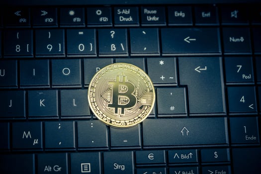 Bitcoin on a computer keyboard photo