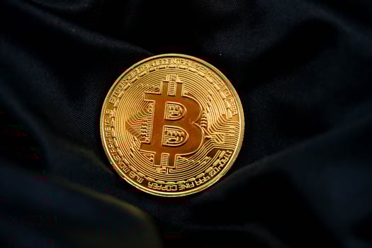 bitcoin on a black background photo