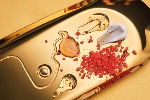 Textures of different cosmetic products on a gold background. photo