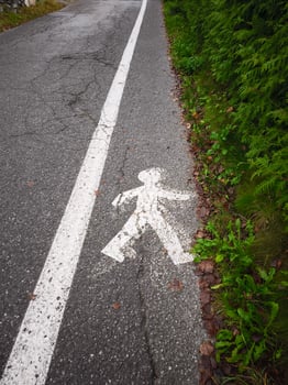 Pedestrian crossing sign indicating safe passage for people walking in chamonix france photo