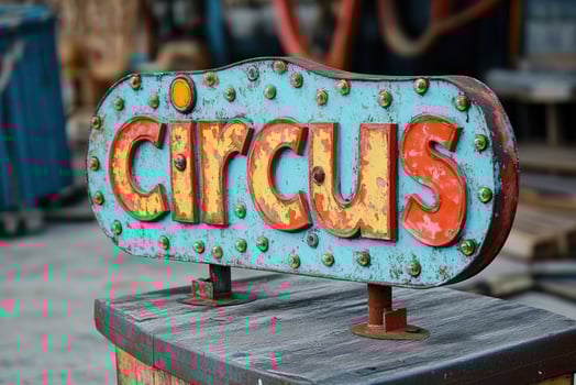 Rusty circus sign showing big top entertainment and stars. photo