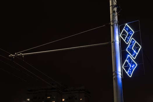Garland on street lights in the city photo