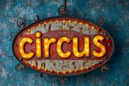 Illuminated circus sign displaying entertainment photo