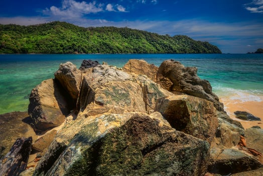 View with a rock in the foreground to the sea photo