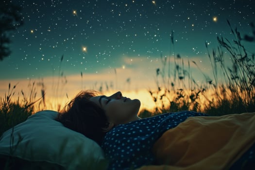 Woman Sleeping Under a Starry Sky at Twilight photo