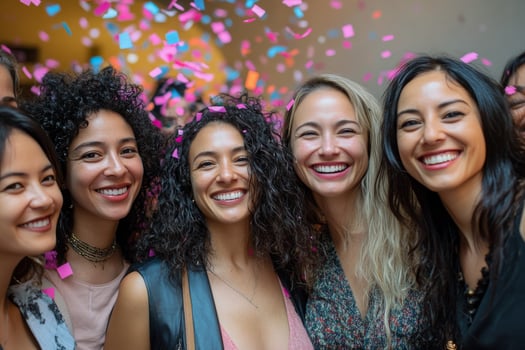 A group of women smiling at the camera photo
