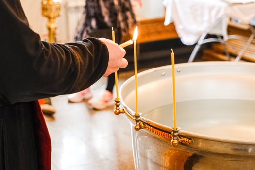 The details chriistening ceremony in the church candles photo