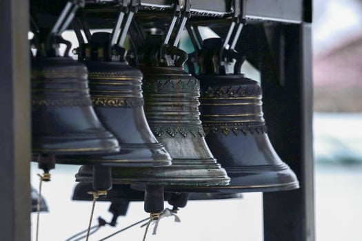 Ancient church tower big bell close up photo
