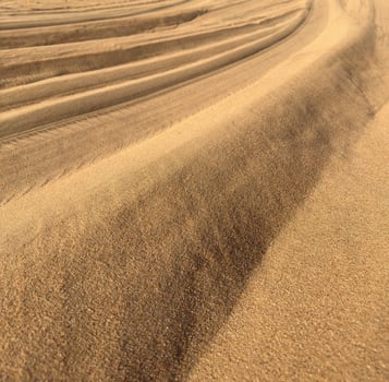 Geometric shapes in the sand. photo