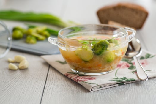 Lunch recipe, Hot Broth with Brussels Sprouts and Vegetables photo