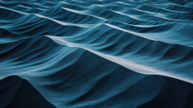 Smooth sand dunes create mesmerizing pattern, showcasing gentle waves and soft textures under natural light. serene landscape evokes sense of calm and tranquility photo
