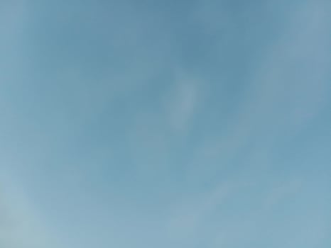 blue sky background with tiny clouds, soft focus, and copy space. Natural beautiful blue sky and white cloud background,At Afternoon. photo