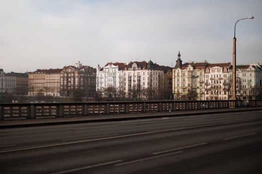 Prague cityscape with vltava river and bridge in the foreground photo