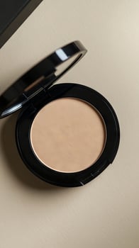 Elegant Beige Compact Powder for a Natural Look photo