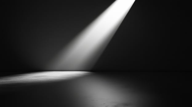Dramatic light beams creating shadows on a dark surface with texture and contrast photo