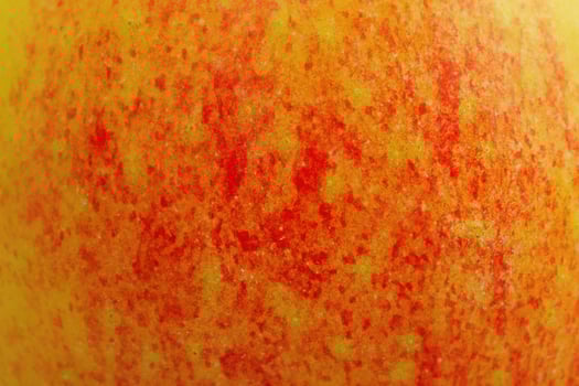 Texture of red and yellow apples as a background macro photo. photo