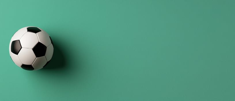 Single soccer ball on green background photo