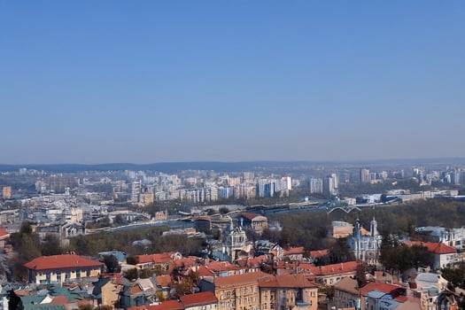 Cityscape panoramic view buildings, bridge, clear sky photo