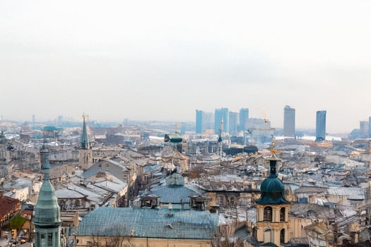 Cityscape panorama winter rooftops, distant skyline, urban sprawl photo
